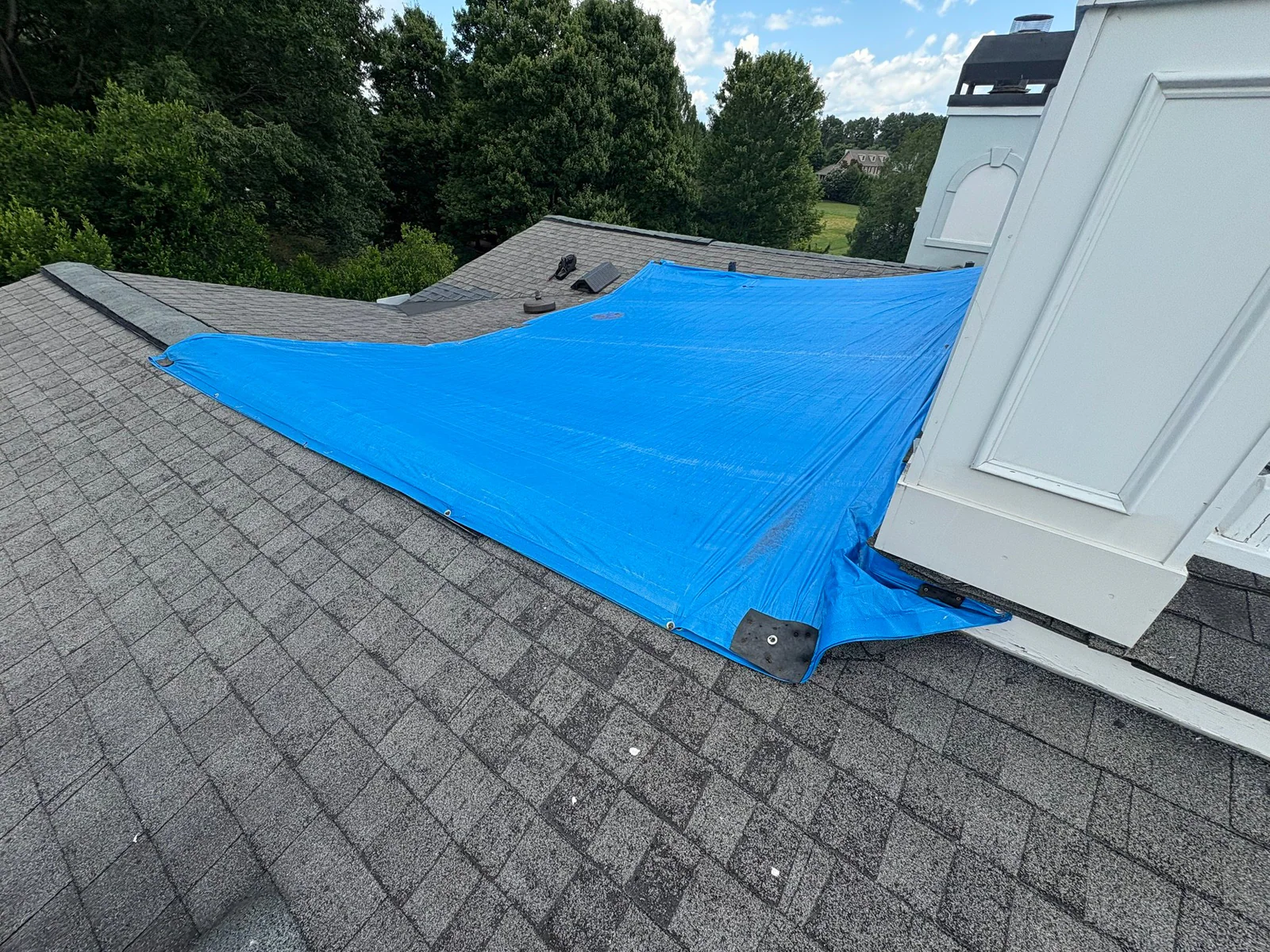 Roof damage documented on a real Denali project in Duluth, GA